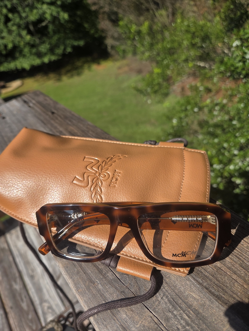 MCM Tan Leather Toiletry Pouch with Tortoiseshell Glasses Case